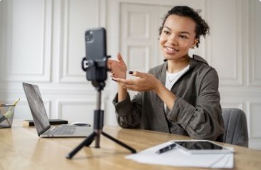 Influencer recording a video with a phone on a tripod